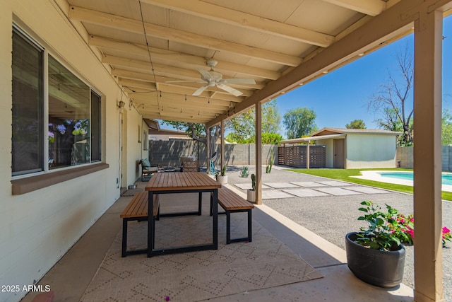 5031 W Grandview Rd, Glendale, AZ 85306 - view of patio with ceiling fan, a fenced backyard, an outdoor structure, and outdoor dining space