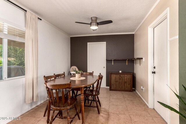 5031 W Grandview Rd, Glendale, AZ 85306 - dining area featuring a ceiling fan, crown molding, light tile patterned floors, and baseboards