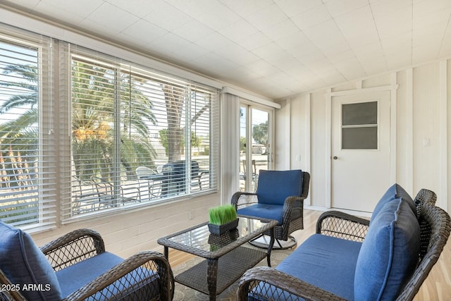 sunroom with lofted ceiling