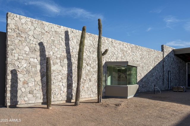 exterior space featuring stucco siding