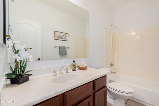 full bath featuring toilet, tile patterned flooring, bathtub / shower combination, and vanity