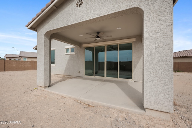 view of patio / terrace featuring ceiling fan