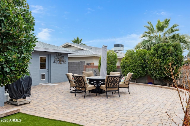 view of patio / terrace featuring outdoor dining area and a fenced backyard