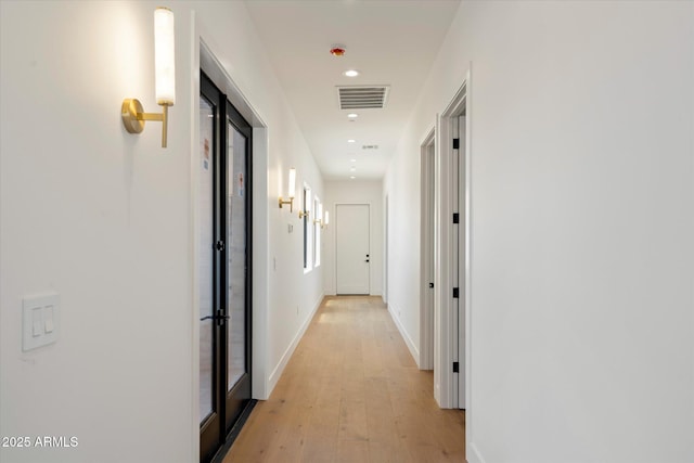 6202 E Larkspur Dr, Scottsdale, AZ 85254 - hall featuring recessed lighting, light wood finished floors, and baseboards