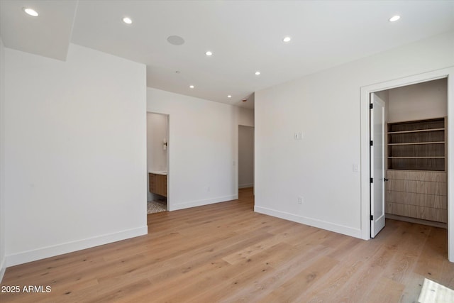 6202 E Larkspur Dr, Scottsdale, AZ 85254 - spare room with light wood-style floors, baseboards, and recessed lighting