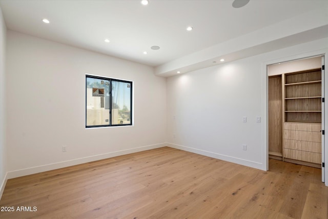 6202 E Larkspur Dr, Scottsdale, AZ 85254 - unfurnished bedroom with light wood-type flooring, recessed lighting, and baseboards