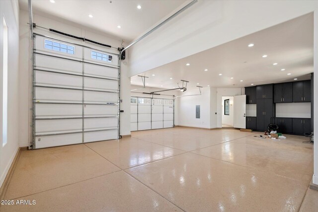 6202 E Larkspur Dr, Scottsdale, AZ 85254 - garage with recessed lighting and baseboards
