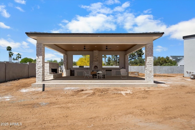 6202 E Larkspur Dr, Scottsdale, AZ 85254 - view of patio featuring an outdoor stone fireplace
