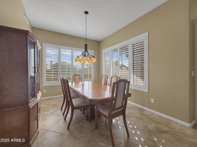 dining area featuring a healthy amount of sunlight and light tile patterned floors