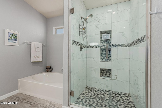 bathroom with independent shower and bath