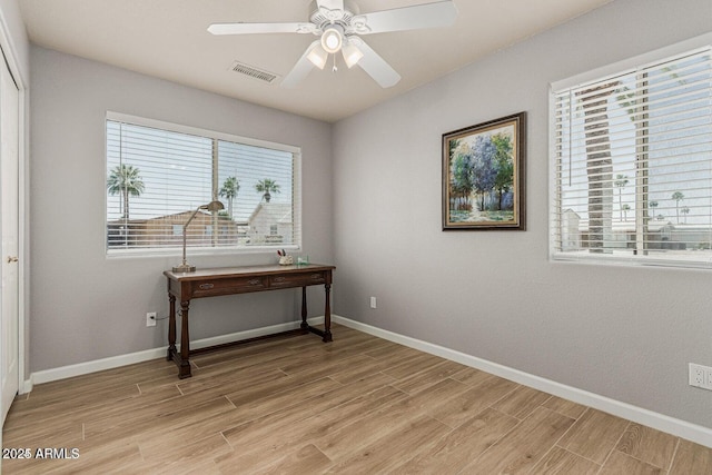 interior space featuring light wood-type flooring and ceiling fan