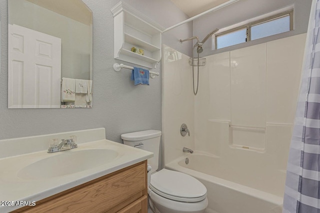 full bathroom with vanity, shower / bathtub combination with curtain, and toilet