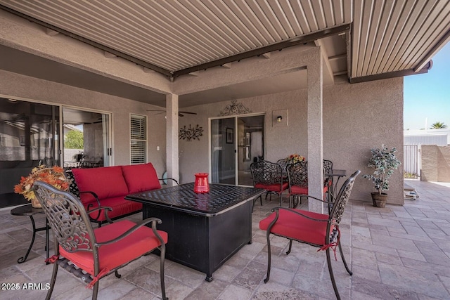 view of patio / terrace with outdoor lounge area and ceiling fan