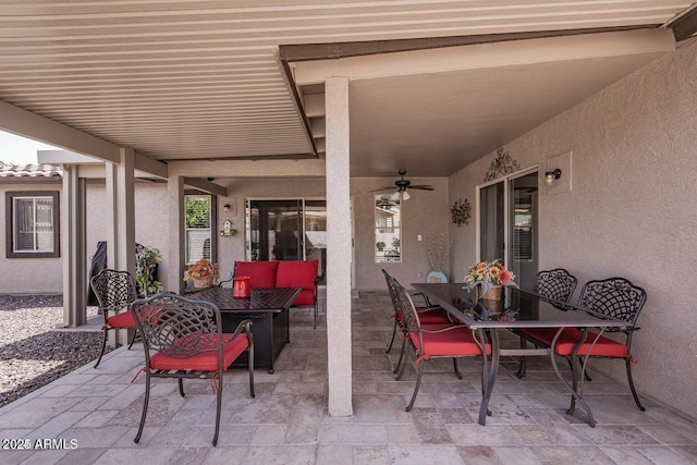 view of patio featuring ceiling fan