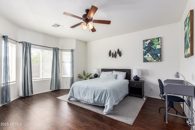 12371 W Hadley St, Avondale, AZ 85323 - bedroom featuring visible vents, baseboards, ceiling fan, and wood finished floors