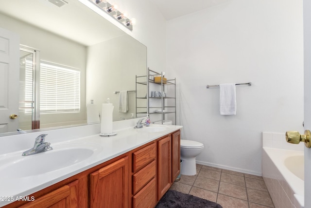12371 W Hadley St, Avondale, AZ 85323 - full bathroom with tile patterned floors, double vanity, a bath, and a sink