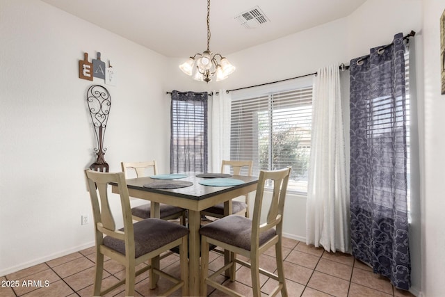 12371 W Hadley St, Avondale, AZ 85323 - dining space with visible vents, baseboards, an inviting chandelier, and light tile patterned floors