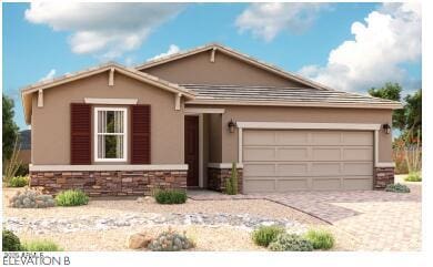 2625 N 195th Dr, Buckeye, AZ 85396 - view of front facade featuring a garage, stucco siding, stone siding, and driveway