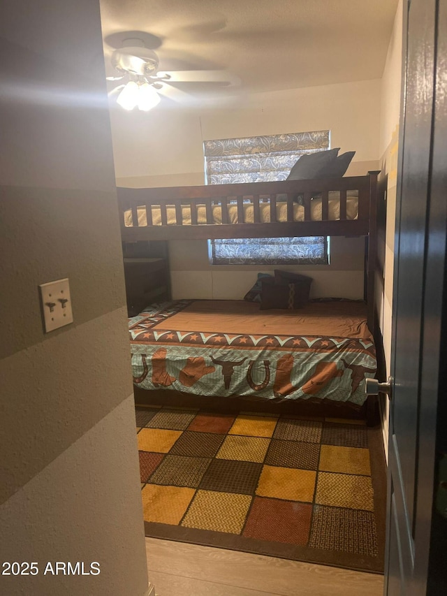 bedroom featuring ceiling fan
