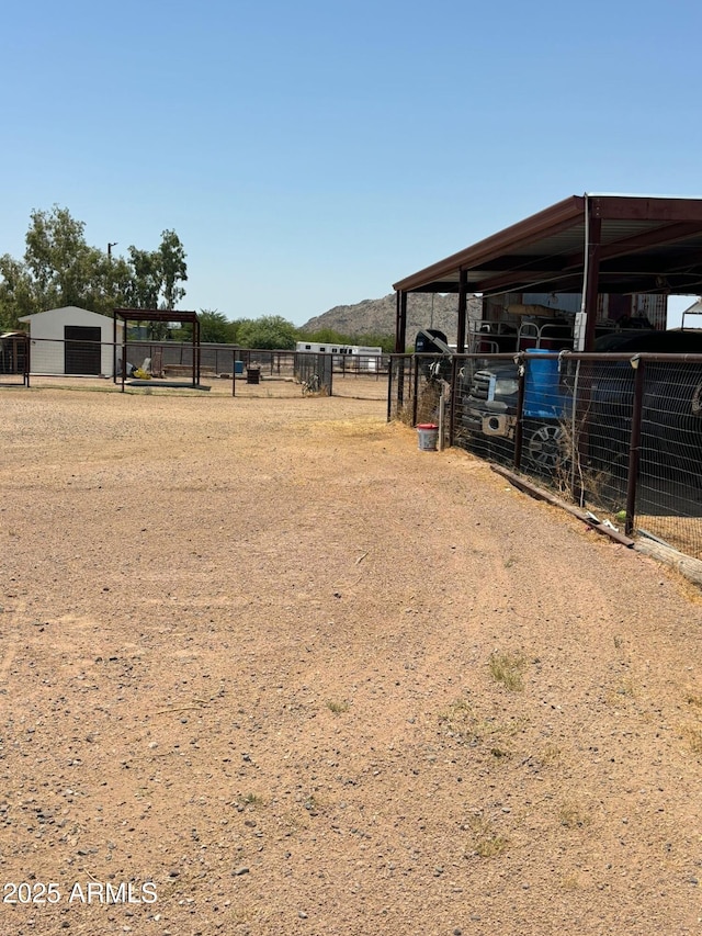 view of yard with an outdoor structure