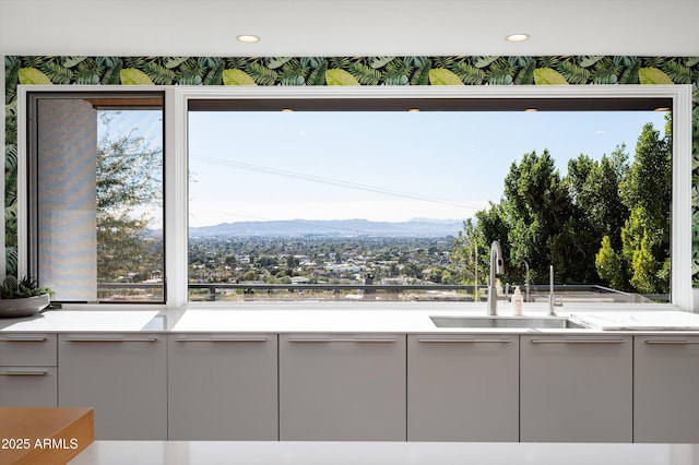 kitchen featuring sink and a mountain view