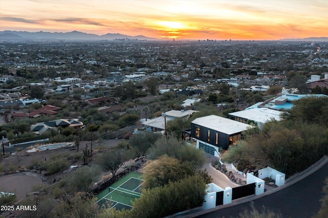 aerial view at dusk with a mountain view