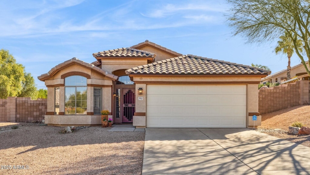 view of front of property featuring a garage