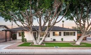 7416 E Holly St, Scottsdale, AZ 85257 - ranch-style home with a carport