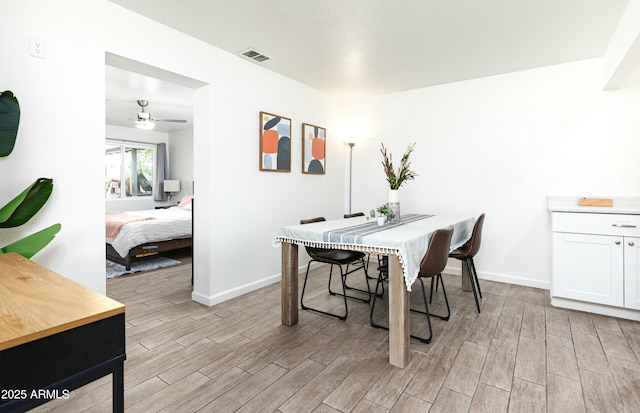 dining space with ceiling fan