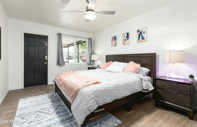 bedroom featuring ceiling fan and light hardwood / wood-style floors