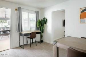 office area with ceiling fan and plenty of natural light