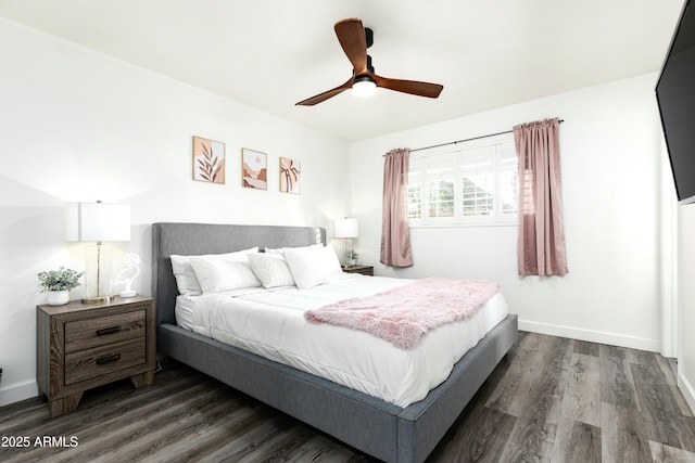 bedroom with ceiling fan and dark wood-type flooring