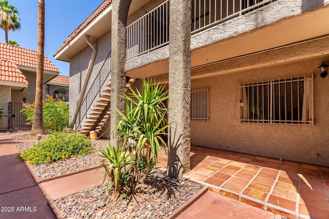 1650 N 87th Ter Unit 25A, Scottsdale, AZ 85257 - view of property featuring stairs