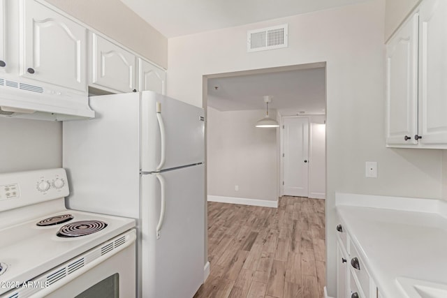 1650 N 87th Ter Unit 25A, Scottsdale, AZ 85257 - kitchen featuring white appliances, under cabinet range hood, white cabinetry, light wood-type flooring, and light countertops