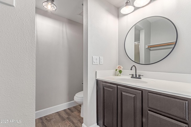 1650 N 87th Ter Unit 25A, Scottsdale, AZ 85257 - bathroom featuring wood finished floors and vanity