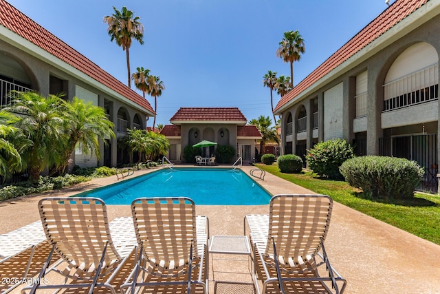 1650 N 87th Ter Unit 25A, Scottsdale, AZ 85257 - community pool featuring a patio