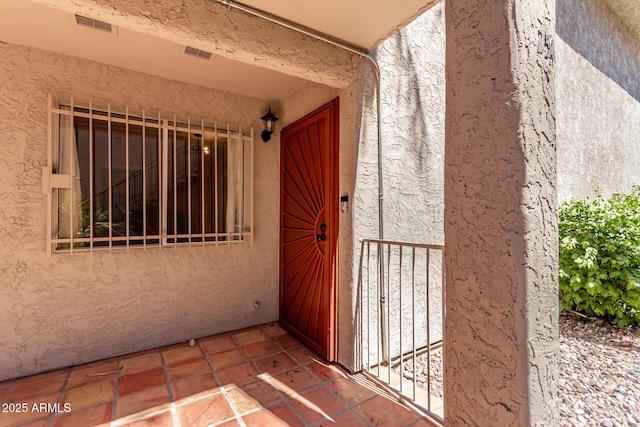 1650 N 87th Ter Unit 25A, Scottsdale, AZ 85257 - property entrance with stucco siding