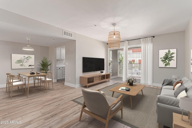 1650 N 87th Ter Unit 25A, Scottsdale, AZ 85257 - living room with light wood-style floors and baseboards