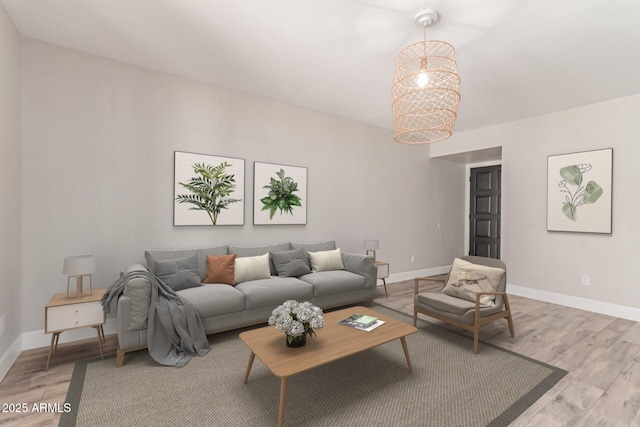 1650 N 87th Ter Unit 25A, Scottsdale, AZ 85257 - living area featuring light wood-style flooring and a chandelier
