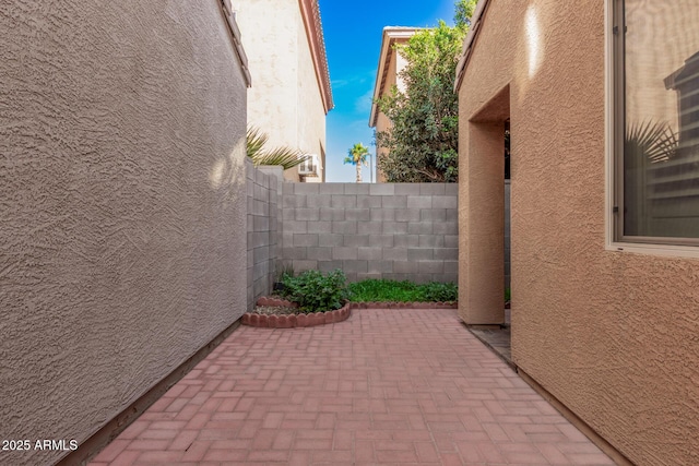 view of patio / terrace with fence