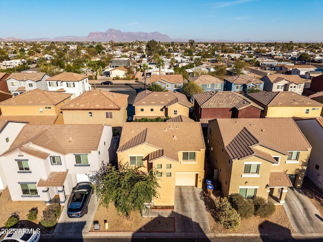 bird's eye view featuring a mountain view and a residential view