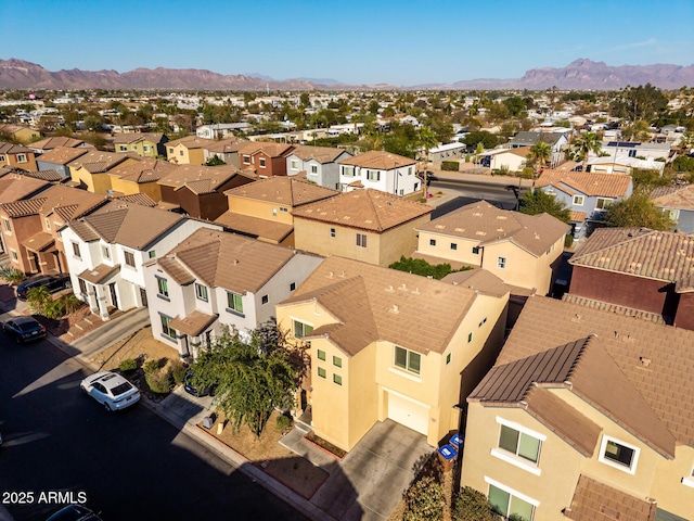 aerial view with a residential view and a mountain view