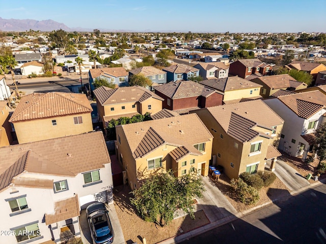 aerial view featuring a residential view and a mountain view