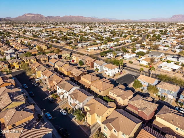 birds eye view of property with a residential view and a mountain view