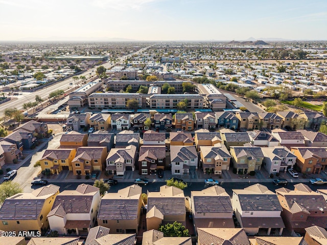 birds eye view of property with a residential view