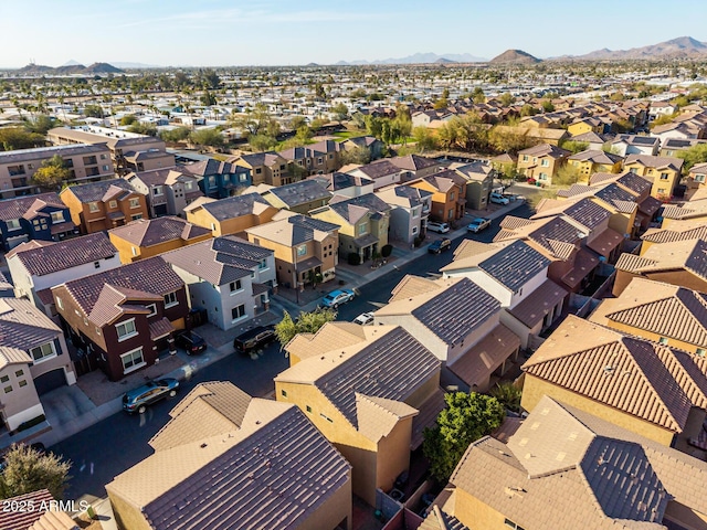 bird's eye view featuring a residential view and a mountain view