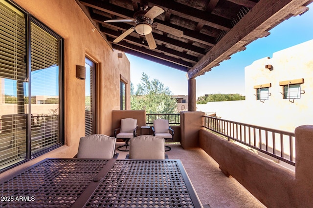 balcony featuring ceiling fan