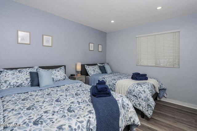 bedroom featuring dark wood-type flooring