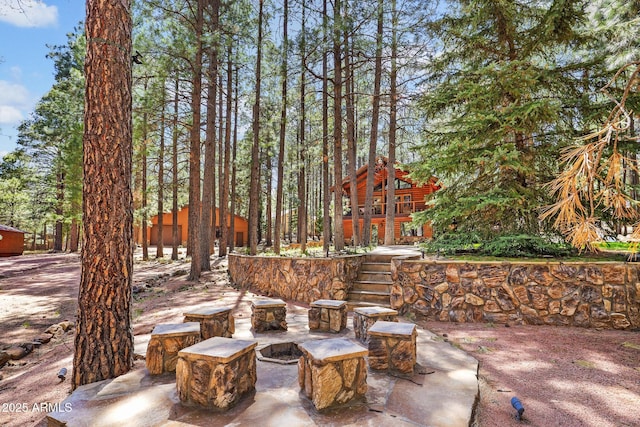 1868 Flicker Dr, Forest Lakes, AZ 85931 - view of patio with a fire pit and stairway