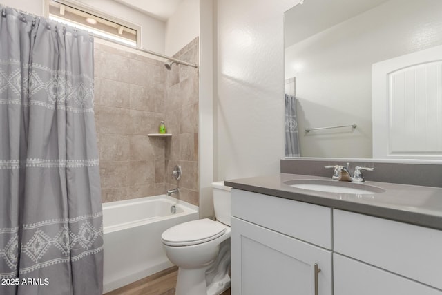 20783 W Pasadena Ave, Buckeye, AZ 85396 - full bath with vanity, toilet, shower / tub combo with curtain, and wood finished floors